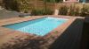 piscine 8x4 avec une terrasse en ipe et liner gris clair